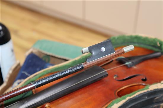 A German three-quarter size violin and bow, cased